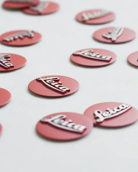 Buttons labeled Leica are distributed on a white background.