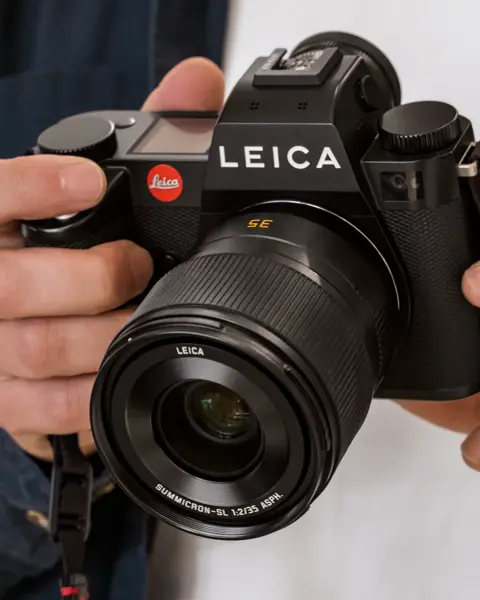 Man holding a camera in his hands