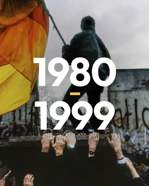 Historical photo of the fall of the Berlin Wall in Germany