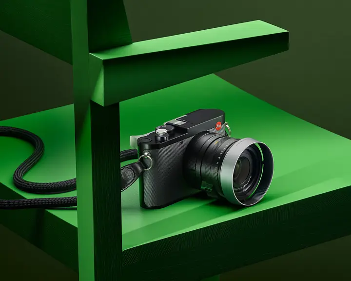 Leica Q3 43 about a green chair
