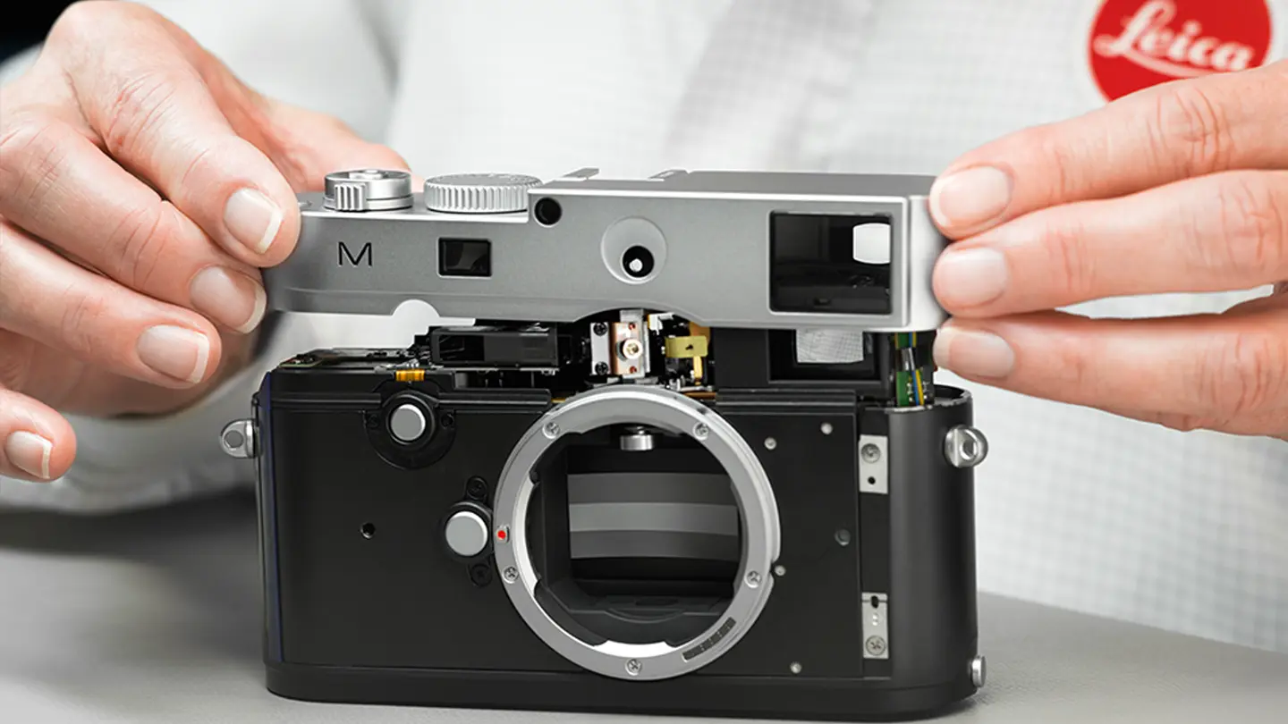 Man repairs a Leica M Camera