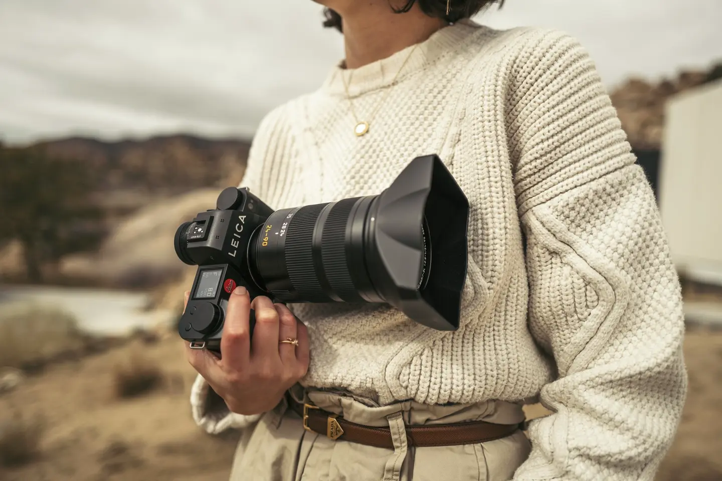 Woman with a Leica SL in her hand