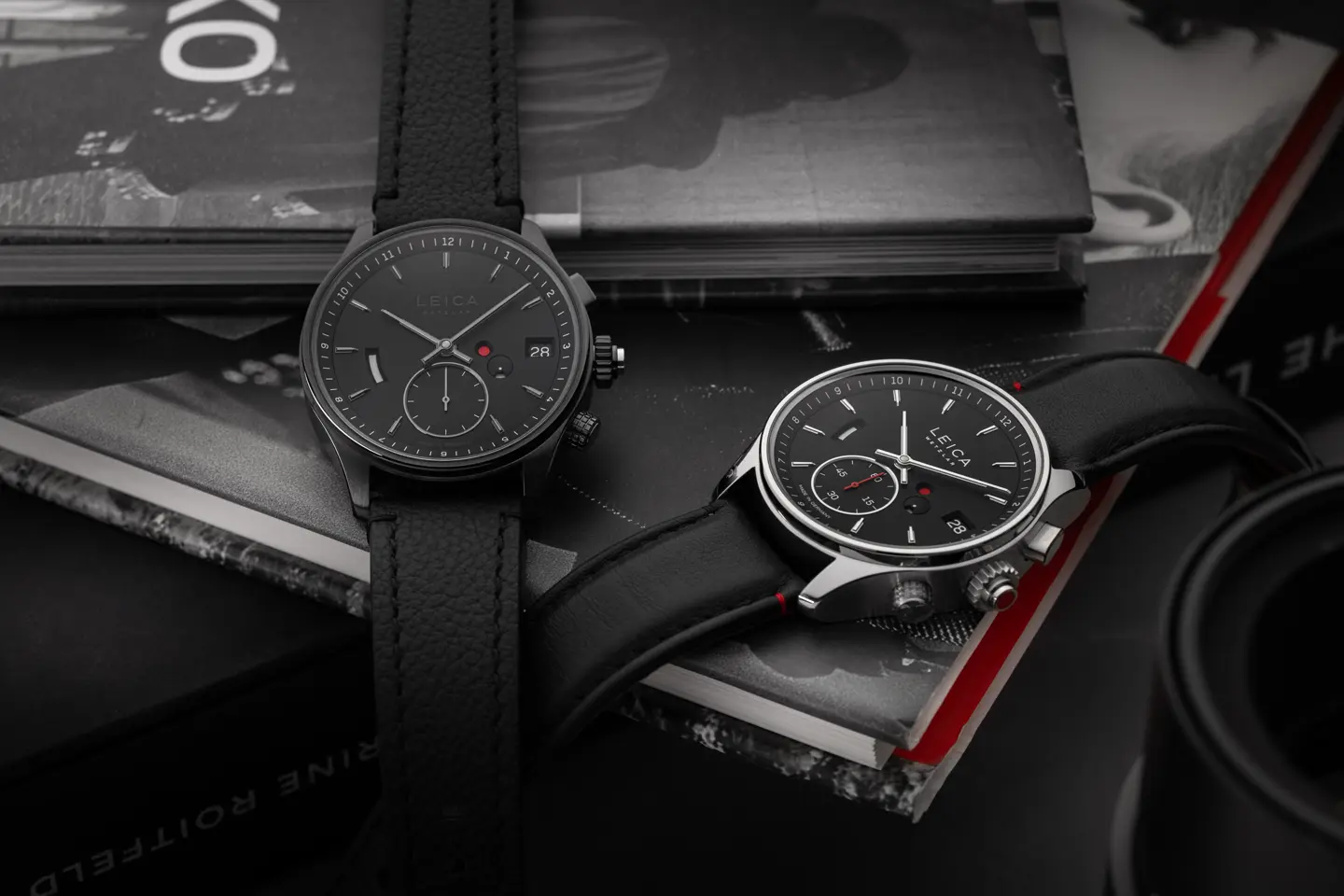 Leica Watches ZM1 and ZM2 on a pile of books.