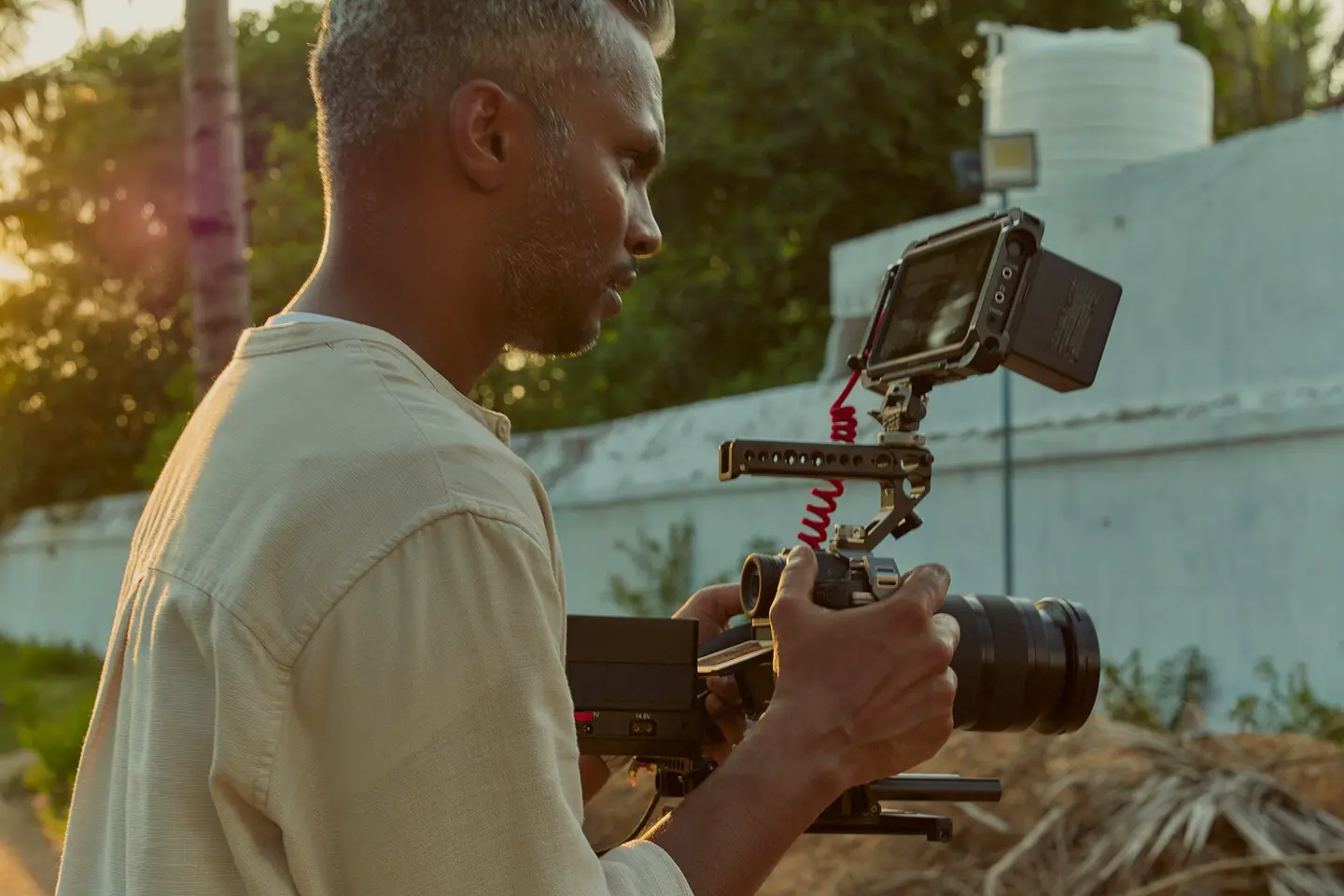 Photographer with Leica SL3-S.