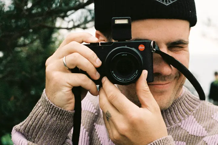 photographer with the leica D-lux 8