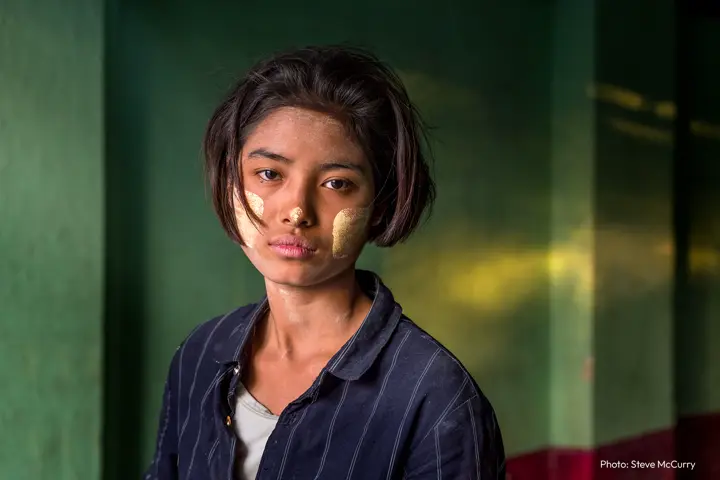 Portrait girl with golden colour on her face