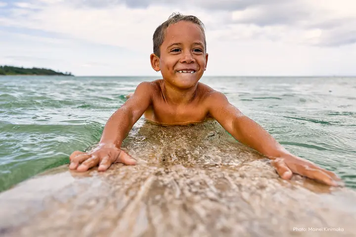 little boy in the sea
