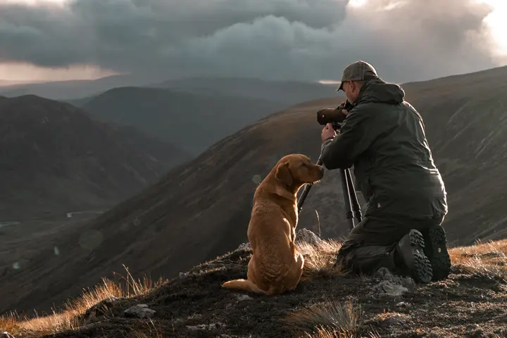Man with dog on the hunt