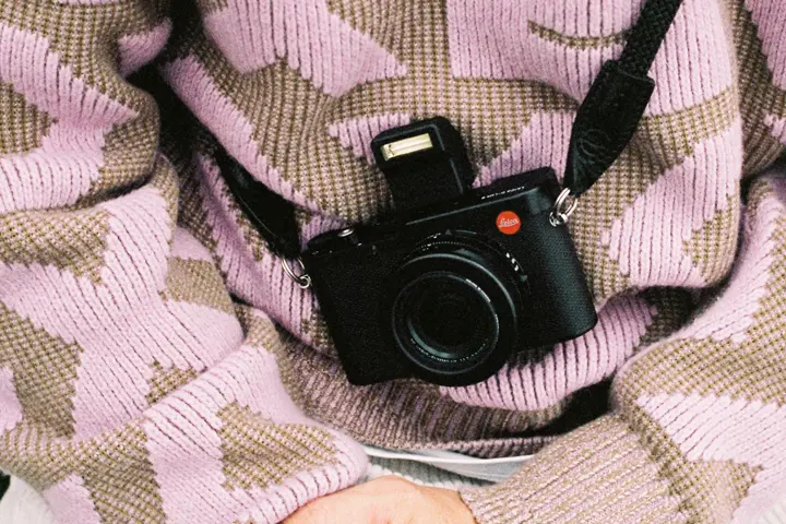 Man with a Leica D-Lux 8