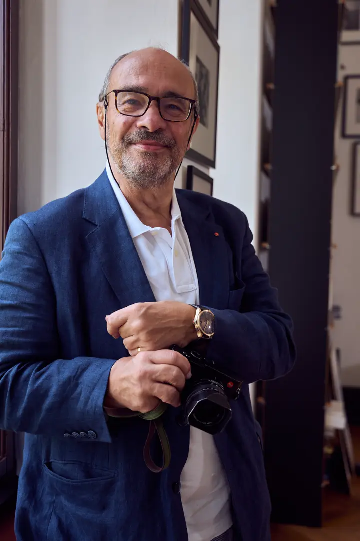 Dr. Kaufmann with leica watch and a leica camera