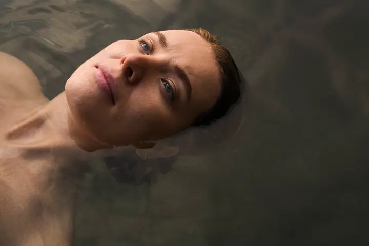 Woman lying in the water