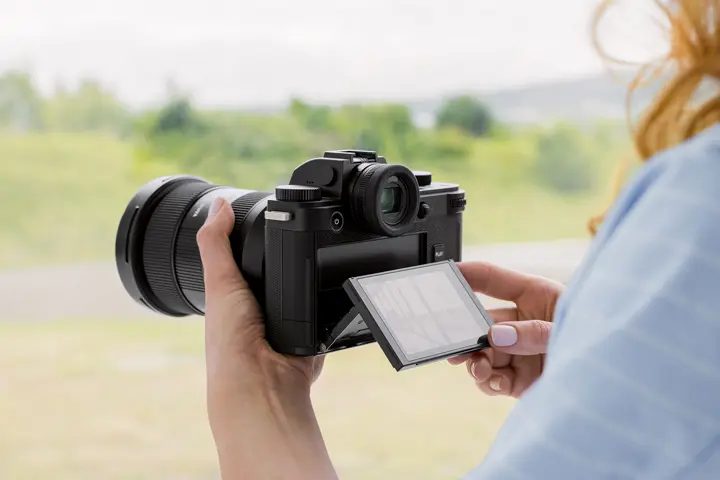 Woman with a Leica Camera