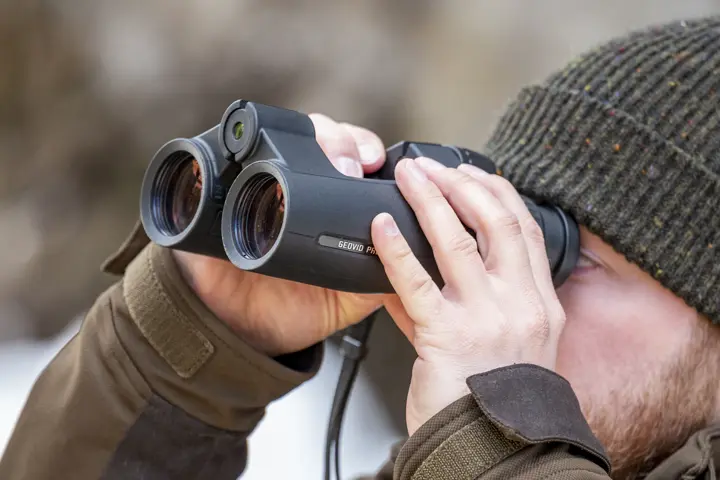 Hunter-observed-by-the-Leica-Geovid-Pro