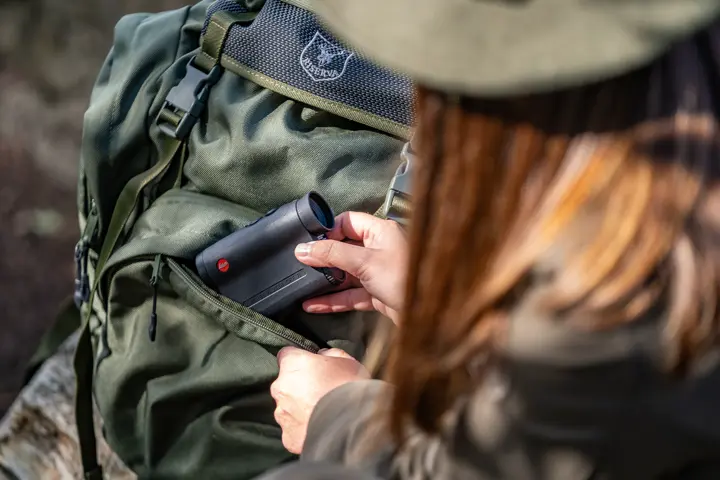 A-Leica-Rangemaster-CRF-R-is-stowed-in-a-backpack