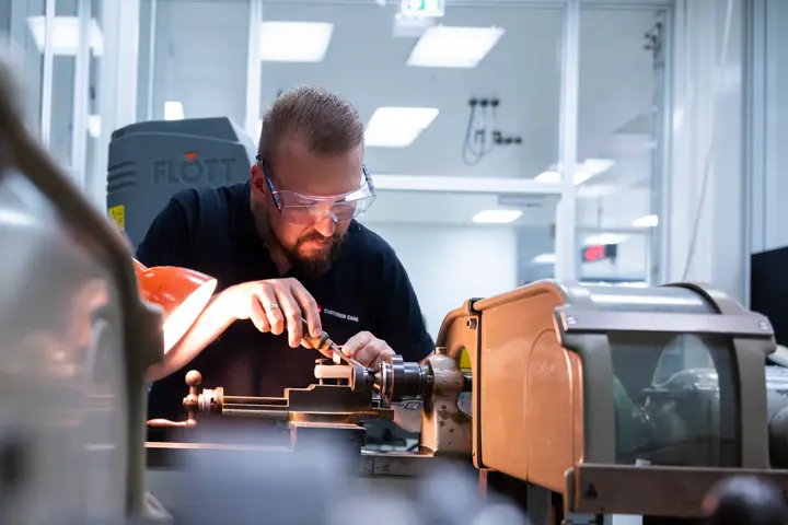 Man who repairs a Leica Camera