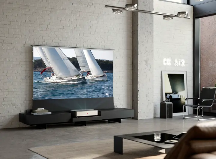 Leica Cine 1 on a Kettnaker lowboard showing a projection with sailingboards on the Leica Screen.