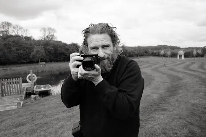 Greg Williams with a Leica in his hands