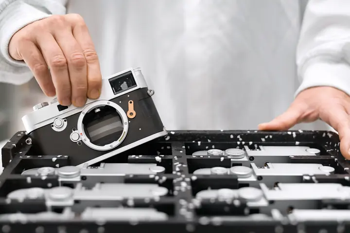 Man puts camera in a box