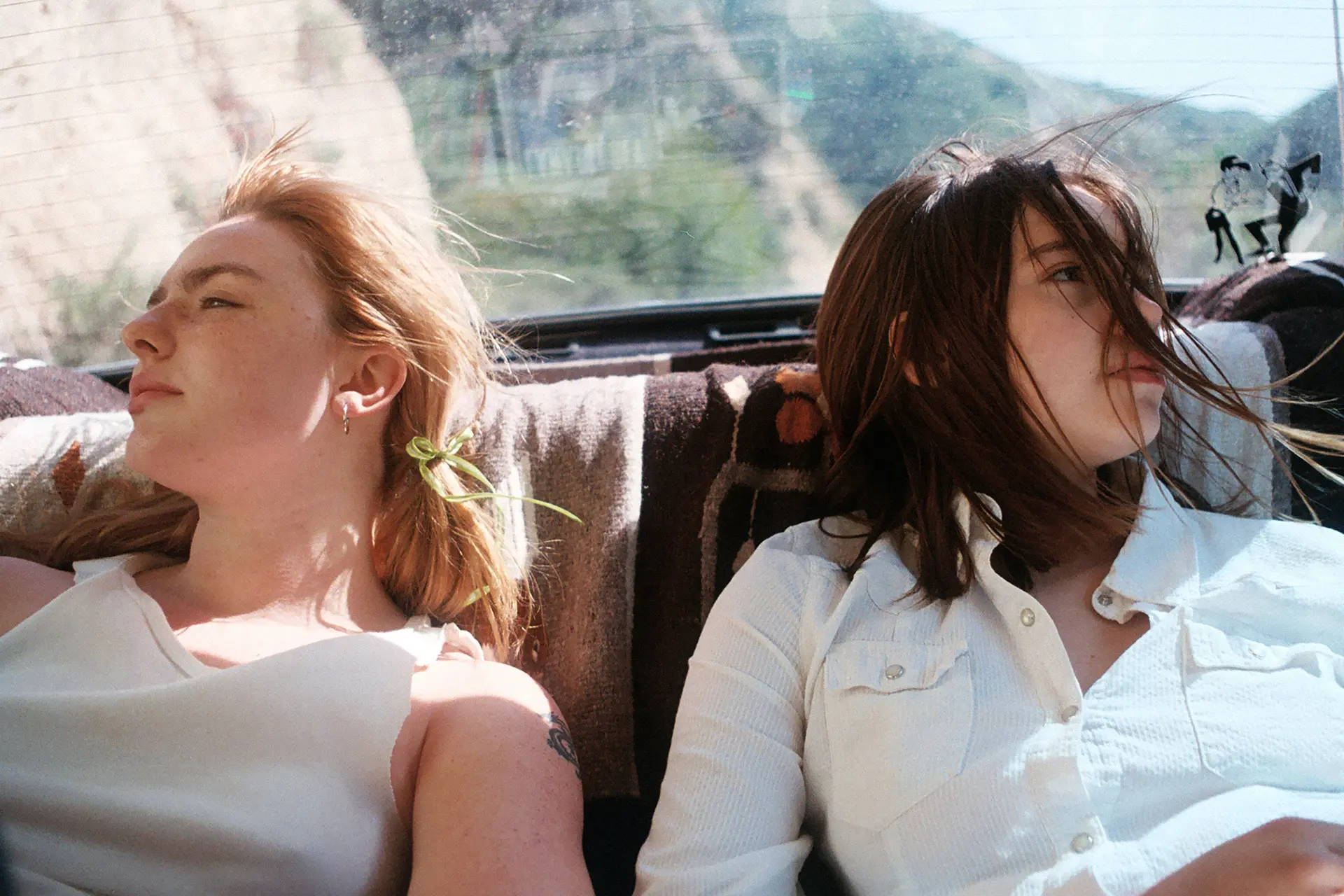 Two women in a cabriolet