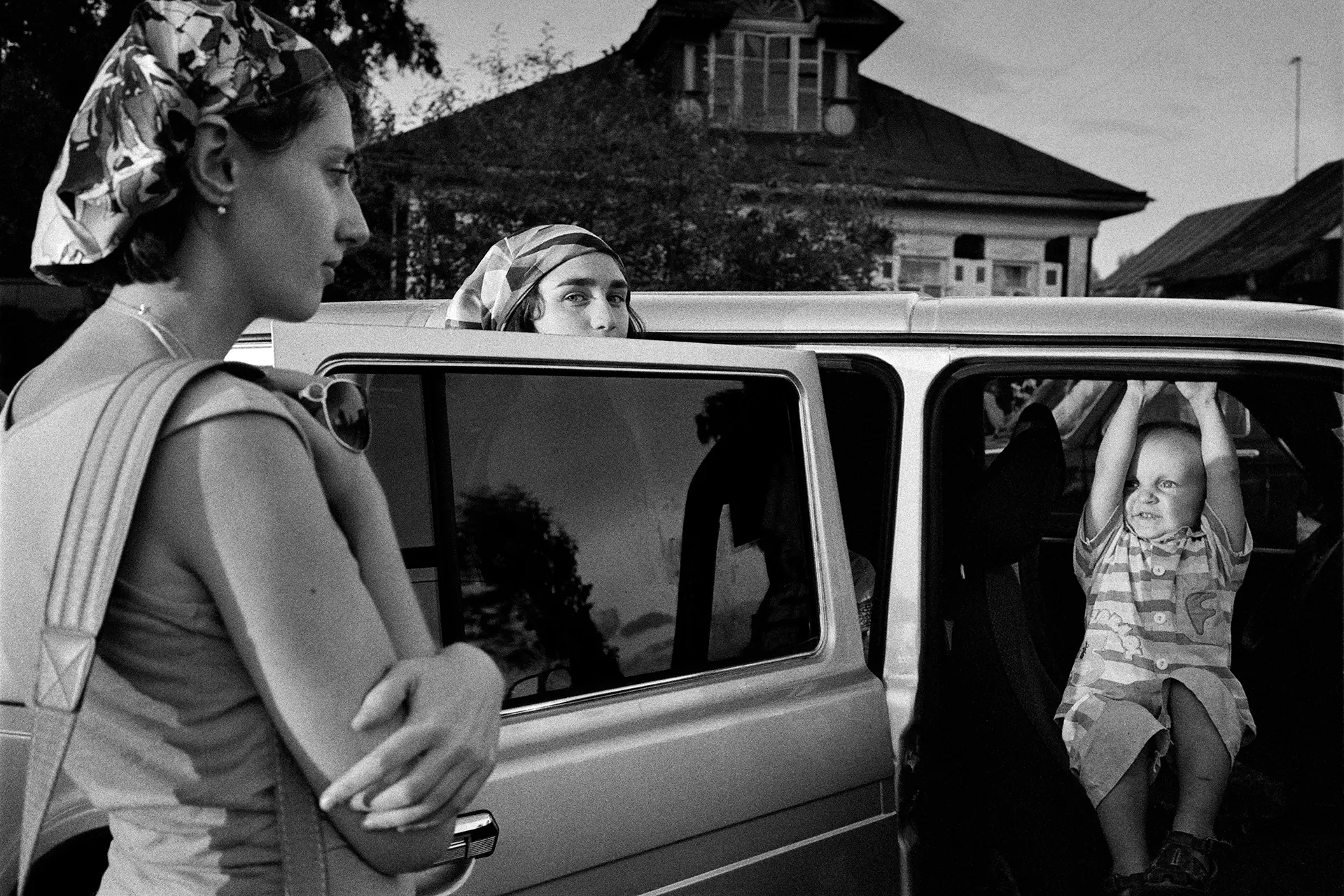 Two women and a child in the car