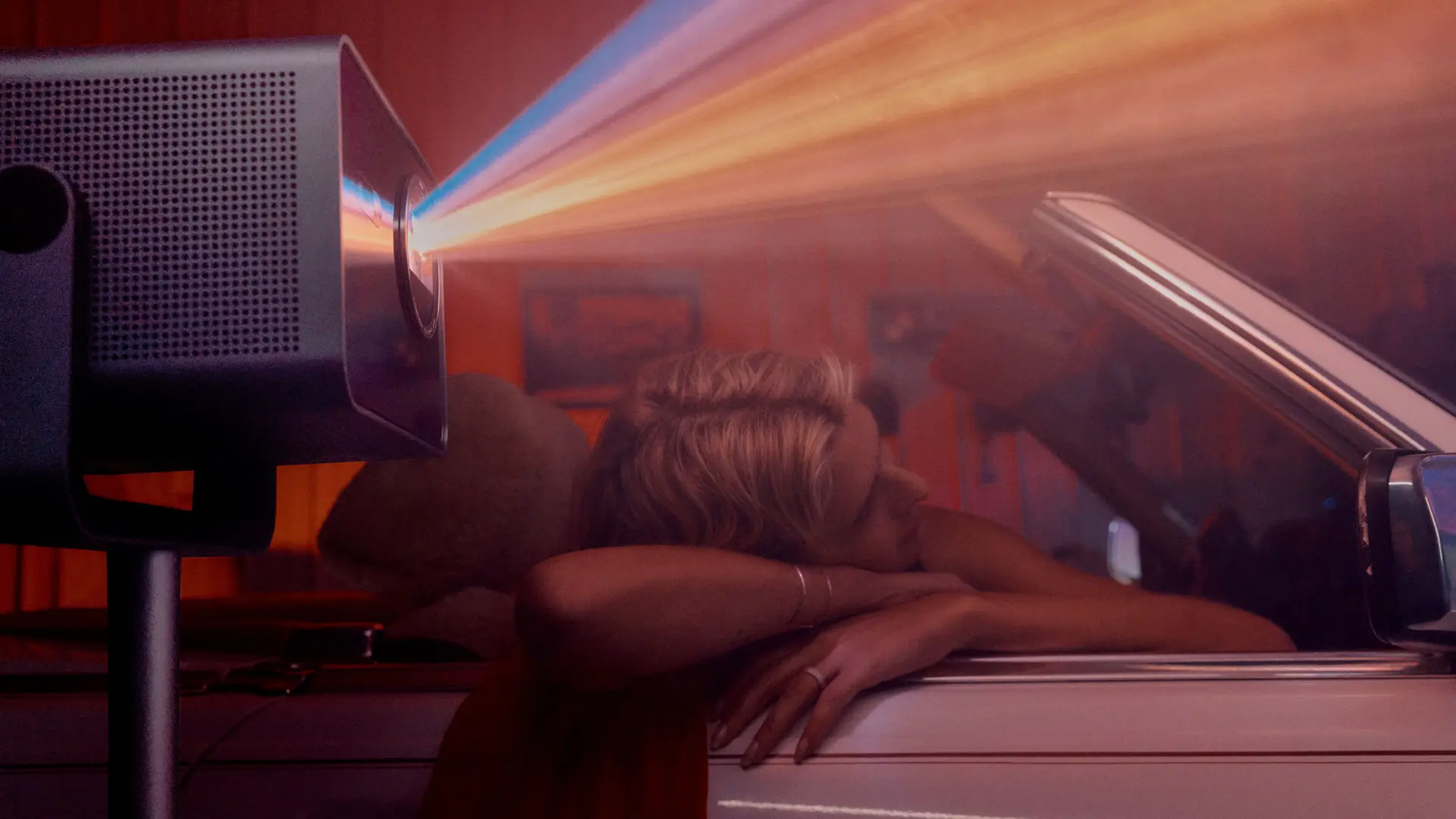 Couple is watching am movie from their car